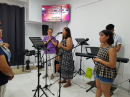 Rush Creek visitors leading music worship